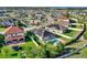 Lovely home aerial view featuring a solar panel roof, a refreshing pool, and in a peaceful neighborhood at 1740 Standing Rock Cir, Oakland, FL 34787