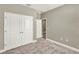 Bedroom featuring carpet floors, and white closets at 1740 Standing Rock Cir, Oakland, FL 34787