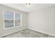 Bedroom with plush carpet, a window, and neutral colors at 1740 Standing Rock Cir, Oakland, FL 34787