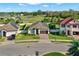 Aerial view of the home featuring a well-manicured lawn and inviting curb appeal at 1740 Standing Rock Cir, Oakland, FL 34787