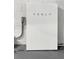 Tesla Powerwall home battery for energy storage in a home with a gray concrete floor and white brick walls at 1740 Standing Rock Cir, Oakland, FL 34787