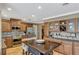 Traditional kitchen with wooden cabinets, stainless steel appliances, and unique backsplash at 1800 Wycliff Dr, Orlando, FL 32803