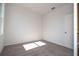 Neutral bedroom with carpet, window, and white walls offers a versatile space for personalized decoration at 1857 Manitoba Ct, Poinciana, FL 34759