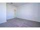 Spacious bedroom with neutral carpeting and white walls at 1857 Manitoba Ct, Poinciana, FL 34759