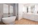 Bright bathroom featuring a freestanding tub, a double sink vanity with decorative mirrors, and wood look flooring at 2161 Snow Rd, Orlando, FL 32814