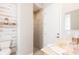 Small bathroom with a toilet, a shower with glass doors and vanity with a sink at 2161 Snow Rd, Orlando, FL 32814