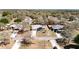 Aerial view of a well-manicured home with a driveway and vibrant green lawn at 2253 Lake Pointe Cir, Leesburg, FL 34748