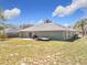 Spacious backyard featuring a large lot and a peaceful residential neighborhood at 2253 Lake Pointe Cir, Leesburg, FL 34748