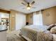 Relaxing bedroom featuring a ceiling fan, a closet, and lots of natural light from the window at 2253 Lake Pointe Cir, Leesburg, FL 34748