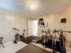 Home exercise room with fitness equipment and decor at 2253 Lake Pointe Cir, Leesburg, FL 34748