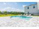 Backyard pool and patio area, perfect for relaxing and entertaining at 288 Auburn Ave, Kissimmee, FL 34747