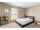 Bedroom with neutral walls, a beach theme, a window, and a black platform bed at 288 Garland, Deltona, FL 32725