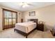 Cozy bedroom featuring a ceiling fan and a large window at 288 Garland, Deltona, FL 32725