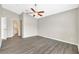 Large bedroom with ample space and a ceiling fan at 3288 Brewster Dr, Kissimmee, FL 34743