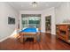 Game room with pool table with view to outdoor living space at 3369 Park Grove Ct, Longwood, FL 32779