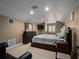 Spacious main bedroom featuring neutral carpet, recessed lighting, ensuite bathroom and a wall-mounted television at 3369 Park Grove Ct, Longwood, FL 32779