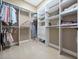 Walk-in closet featuring custom shelving for optimal storage and organization at 3369 Park Grove Ct, Longwood, FL 32779