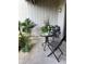 Cozy outdoor patio featuring comfortable seating and lush greenery, creating a relaxing space at 402 Cypress Dr # 402, Haines City, FL 33844