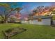 Expansive backyard with lush green lawn and well-maintained landscaping, perfect for outdoor activities at 4029 Cool Water Ct, Winter Park, FL 32792