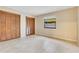 Bedroom featuring two closets, a large window, and tile floors at 4029 Cool Water Ct, Winter Park, FL 32792