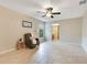 Spacious living room with a ceiling fan and natural light at 4029 Cool Water Ct, Winter Park, FL 32792