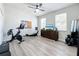 Spacious exercise room features modern workout equipment and a ceiling fan at 6244 Little Lake Sawyer Dr, Windermere, FL 34786