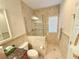 Updated bathroom featuring glass shower, tiled walls, and granite countertop at 802 Rosa St, Celebration, FL 34747