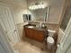 Well-maintained bathroom with granite countertops and tiled floors at 802 Rosa St, Celebration, FL 34747