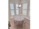 Bright breakfast nook featuring three windows with white shutters at 802 Rosa St, Celebration, FL 34747