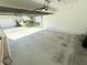 Well-maintained garage interior with a clean concrete floor and an automatic door opener at 802 Rosa St, Celebration, FL 34747