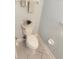 Half bathroom featuring a toilet and a neutral-tone wall at 802 Rosa St, Celebration, FL 34747