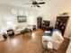 Comfortable living room with hardwood floors, sofa, and furniture at 802 Rosa St, Celebration, FL 34747