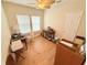 Bright office space featuring hardwood floors and natural light at 802 Rosa St, Celebration, FL 34747