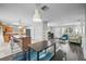 Open kitchen view with large island, updated countertops, and barstool seating at 825 Agnes Dr, Altamonte Springs, FL 32701