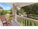 Enjoy the outdoors from this charming porch with wood floors and neighborhood views at 871 Cynthianna Cir, Altamonte Springs, FL 32701