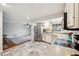 Open-concept kitchen seamlessly connects to a living area with tile flooring at 101 Ludlow Dr, Longwood, FL 32779