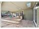This covered patio features brick flooring, a skylit ceiling, and a stainless steel grill for outdoor cooking at 101 Ludlow Dr, Longwood, FL 32779