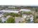 Aerial view of residential neighborhood near shopping centers and commercial buildings at 102 Spanish Moss Ct, Orlando, FL 32828