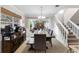 Inviting dining room with stylish furniture and natural light from the outdoor space at 102 Spanish Moss Ct, Orlando, FL 32828