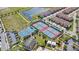 Aerial view showcases community amenities including tennis and basketball courts, a pool, cabanas, and nearby residential housing at 10236 Beechwood Ln, Orlando, FL 32832