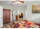 This main bedroom features wood floors, neutral paint, and lots of closet space at 10290 Cypress Vine Dr, Orlando, FL 32827