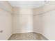 Empty walk-in closet with carpet flooring and wire shelving at 1727 Garden View St, Mascotte, FL 34753