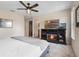 Serene main bedroom featuring soft carpeting, ample natural light and a large TV at 176 Blue Jay Way, Davenport, FL 33896