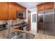 Well-equipped kitchen featuring stainless steel appliances, granite countertops, and ample cabinet space at 2166 Woodbridge Rd, Longwood, FL 32779