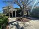 Walkway under mature tree leading to community clubhouse and recreational facilities at 2168 Continental St, St Cloud, FL 34769