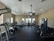 Bright community gym featuring modern exercise equipment on a black rubber floor at 2168 Continental St, St Cloud, FL 34769