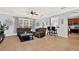 Inviting living room with tiled floors, ceiling fan, and an open layout into the kitchen at 2168 Continental St, St Cloud, FL 34769