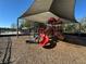 A colorful playground with slides and climbing equipment under a sunshade at 2168 Continental St, St Cloud, FL 34769