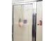 Shower stall featuring a glass door and a handheld shower fixture at 2168 Continental St, St Cloud, FL 34769