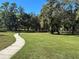 Enjoy scenic strolls on the winding sidewalk pathways through the neighborhood's common green spaces at 2168 Continental St, St Cloud, FL 34769